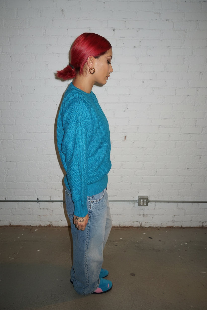 Blue knitted sweater