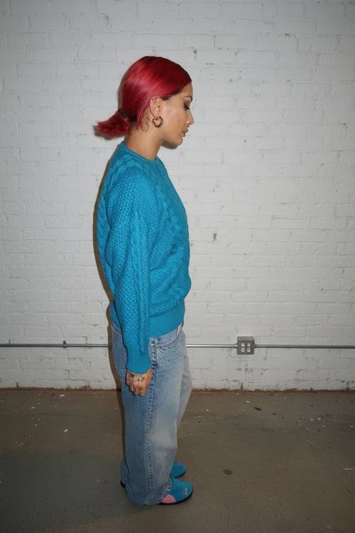 Blue knitted sweater