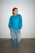 Blue knitted sweater
