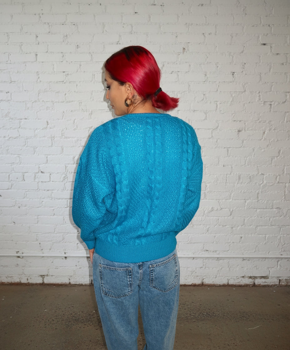 Blue knitted sweater
